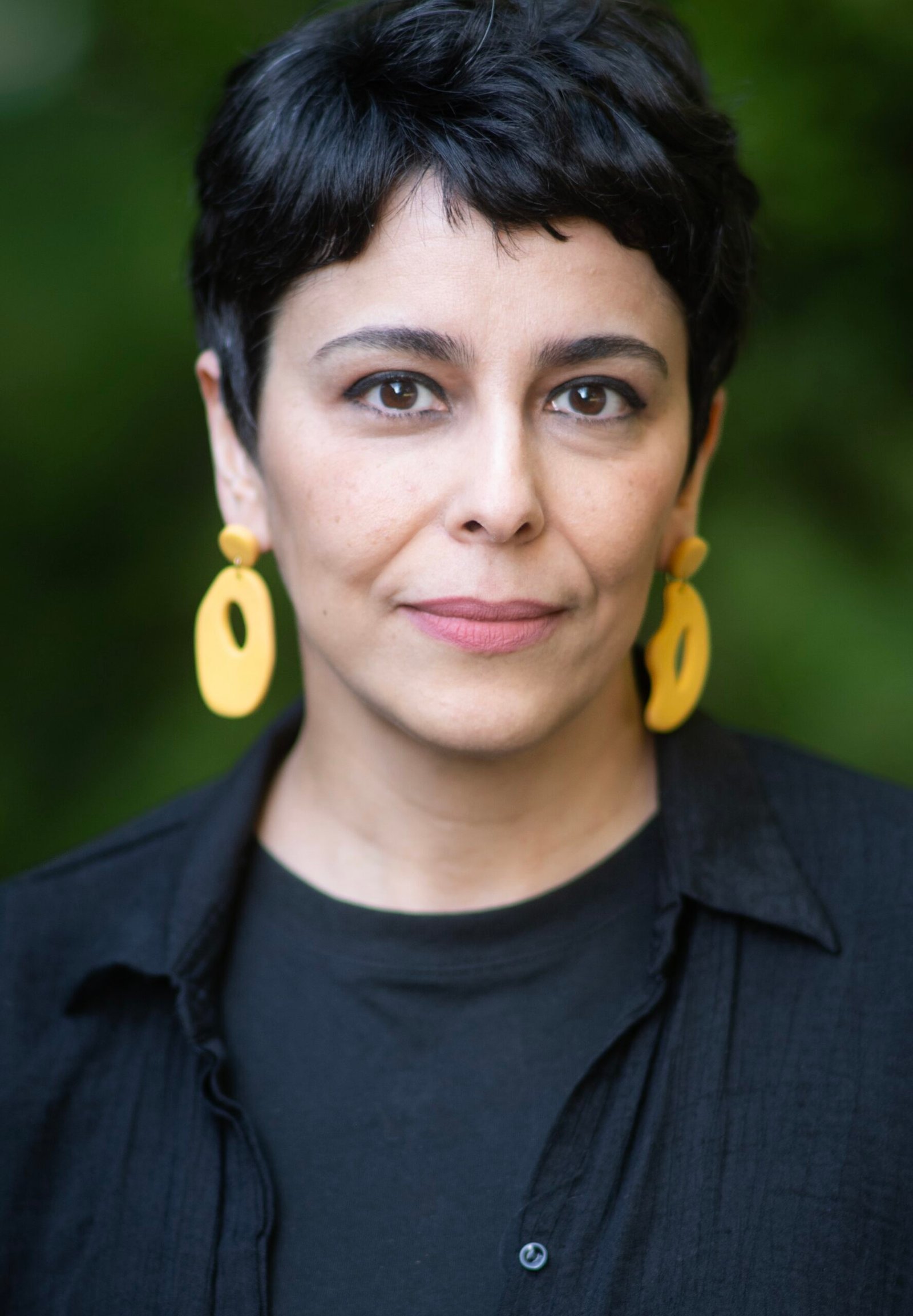 Azadeh Zanjani headshot, close color portrait